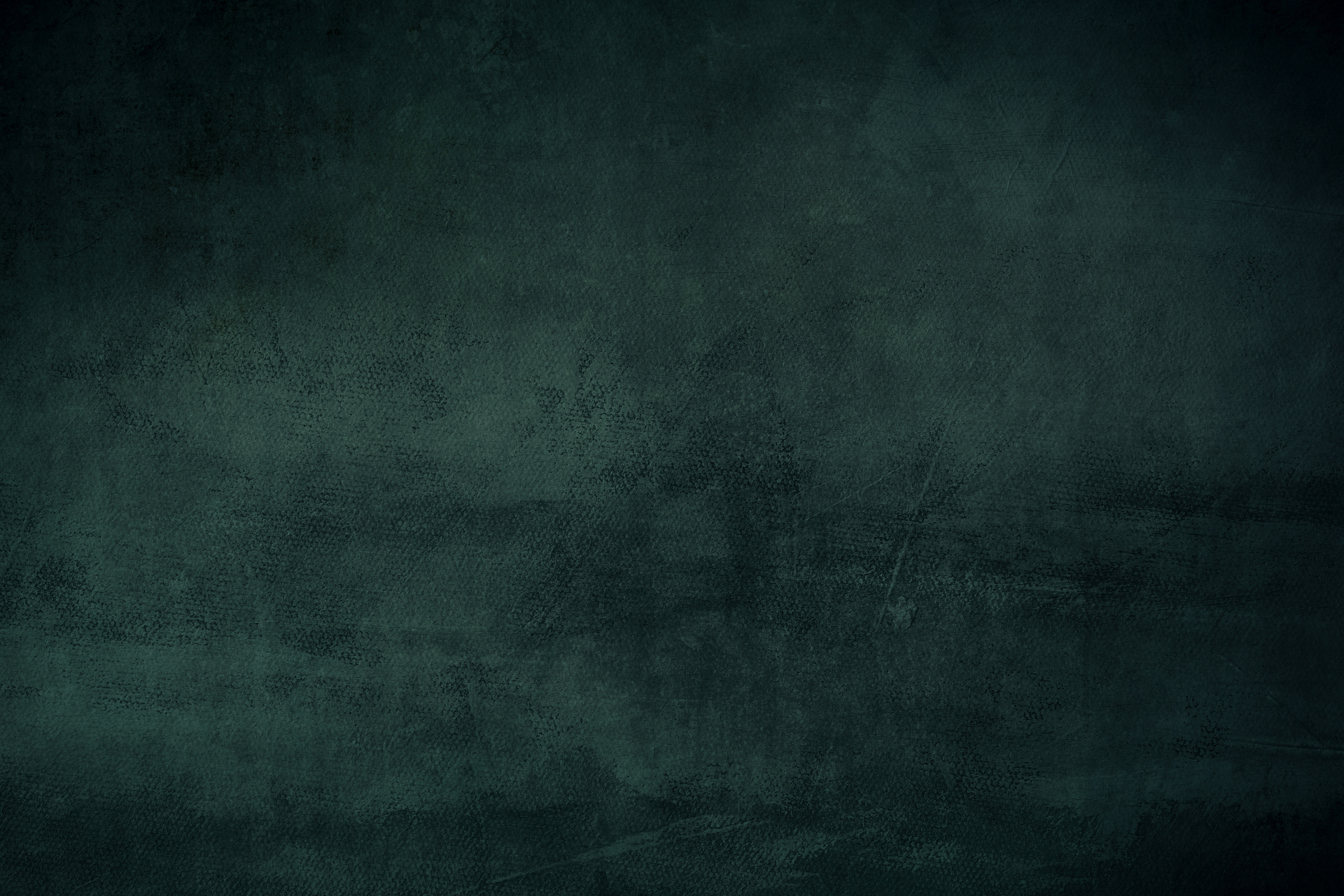 dark green grungy backdrop or texture